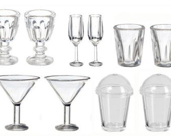 May include: Set of eight clear glass drinking glasses in various shapes and sizes, including martini glasses, shot glasses, and wine glasses.