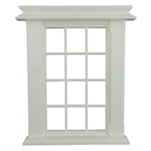 May include: White painted wooden window frame with 12 panes of glass. The frame has decorative moulding around the top and bottom.