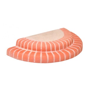 May include: A half-round brick step made of terracotta with a light brown top and a reddish-orange bottom.