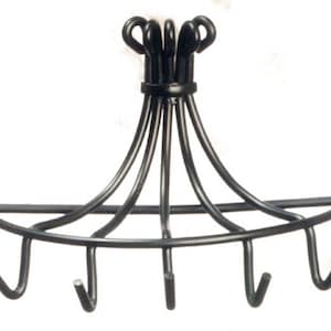 May include: Black metal pot rack with five hooks and a curved shelf.