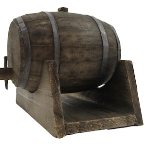 May include: A wooden barrel with metal hoops, resting on a wooden stand. The barrel has a small spout on the side.