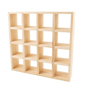 May include: A wooden shelf unit with 18 square compartments. The shelf is made of natural wood and has a light brown color.