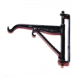 May include: Black metal wall-mounted bracket with a twisted metal arm and a hook at the end. The bracket has a decorative design and is suitable for hanging items.