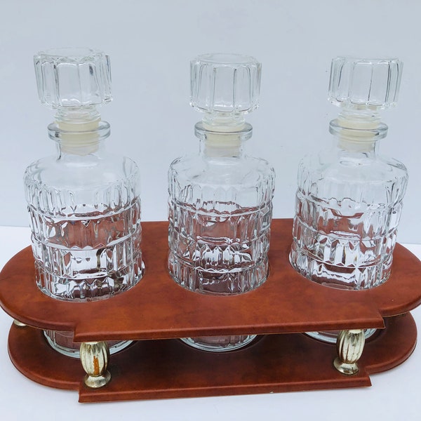 Vintage, French, Set Of Three, Decanter Set With Matching Stoppers in Faux Leather Caddy