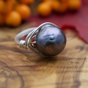 Anillo de perla negra en plata de ley