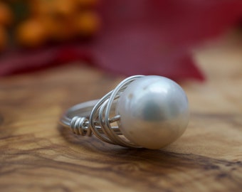 Statement parelring: AA+ witte parel, sterlingzilver