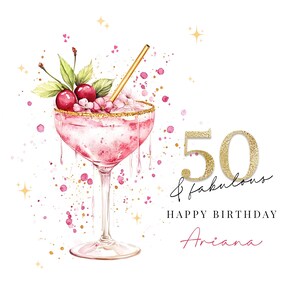 May include: A watercolor-style birthday card featuring a pink cocktail with cherries, flowers, and a gold straw. The card says "50 & fabulous" and "Happy Birthday Ariana" in gold and pink script on a white background.