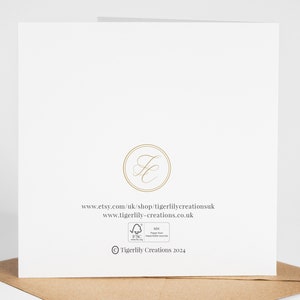 May include: White card with a gold logo and website address: www.etsy.com/uk/shop/tigerlillycreationsuk and www.tigerlilly-creations.co.uk. The card also has a small FSC logo and the text "&copy; Tigerlilly Creations 2024".