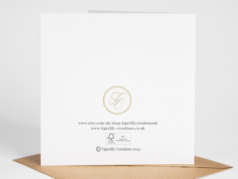 May include: White card with a gold logo and website address: www.etsy.com/uk/shop/tigerlillycreationsuk and www.tigerlilly-creations.co.uk. The card also has a small FSC logo and the text "&copy; Tigerlilly Creations 2024".