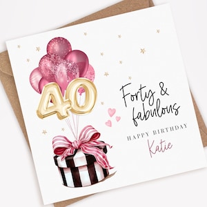 May include: A birthday card with a gold number 40 surrounded by pink and white balloons. The card says "Forty & fabulous" and "Happy Birthday Katie".