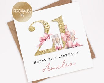 May include: A gold glitter card with the number 21 and the text "Happy 21st Birthday Amelia". The number 21 is decorated with pink bows and champagne glasses.