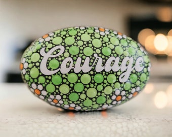 Positivity Stone. "Courage" 8cm wide. White daisy inspired border, green background.
