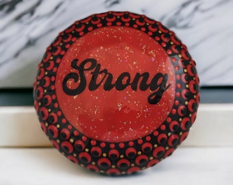 Positivity Stone. "Strong" 9cm round. Red and Black