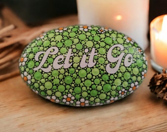 Positivity Stone. "Let It Go". White daisy inspired border. Green and White background.Hand Made Stone  12cm wide.