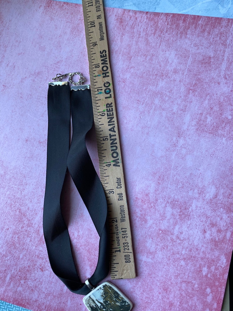 Black gothic pendant on chocker length ribbon with toggle clasp change the ribbon and it becomes very masculine