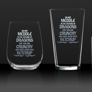 a group of three glasses sitting next to each other