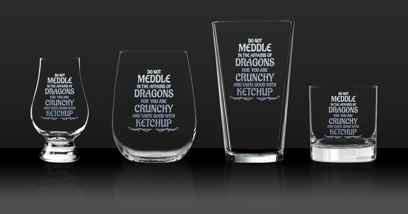 a group of three glasses sitting next to each other