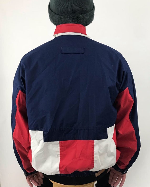 red, white, and blue windbreaker - Gem