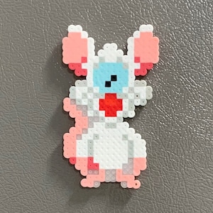 Pinky Perler bead magnet
