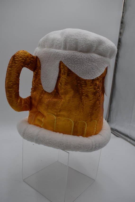 A giant plush foam beer mug you wear on your head — instantly ridiculous, immediately iconic at any Oktoberfest or pub crawl.