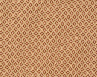 Jacquard con estampado de rombos en tonos dorados y rojos, 54 pulgadas.