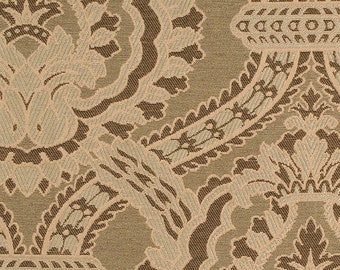 May include: A close-up of a brown and beige fabric with a paisley pattern. The fabric has a textured surface and a subtle sheen.