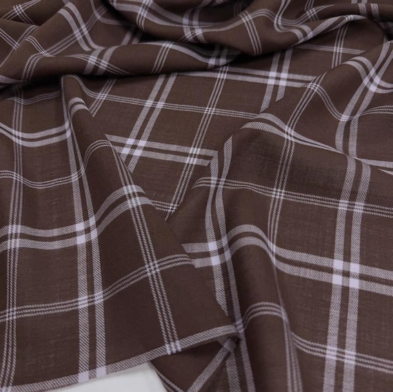 Plaid worsted wool fabric sold by yard