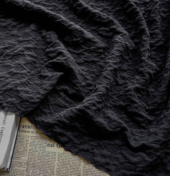 Textured embossed fabric by the yard