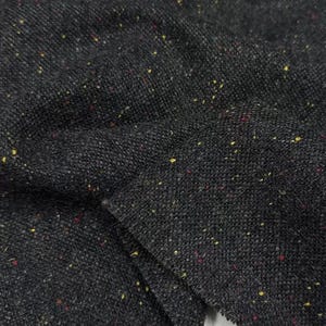Wool fabric with colorful specks by the yard