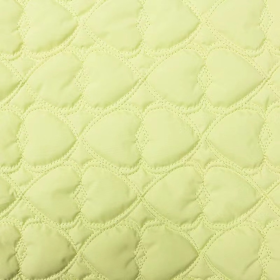 Textured quilted padded fabric by the yard