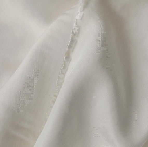 Ivory Triacetate fabric by the yard