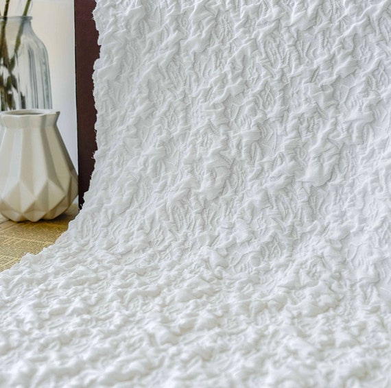 Textured embossed fabric by the yard