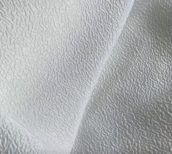 Jacquard embossed silk fabric by the yard