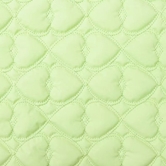 Textured quilted padded fabric by the yard