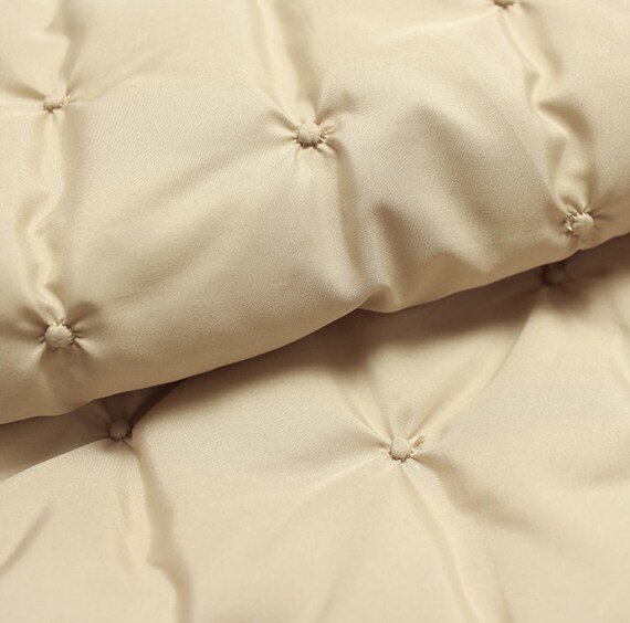 Textured quilted padded fabric by the yard