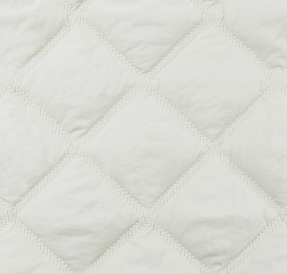 Embroidered Textured quilted padded fabric by the yard