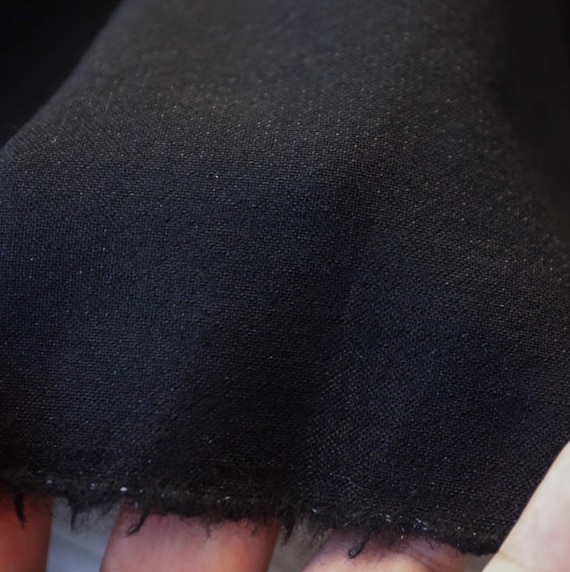Light weight shimmery wool fabric by the yard