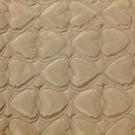 Textured quilted padded fabric by the yard