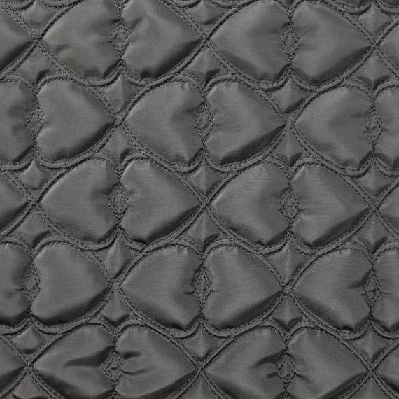 Textured quilted padded fabric by the yard