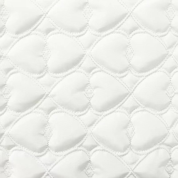 Textured quilted padded fabric by the yard