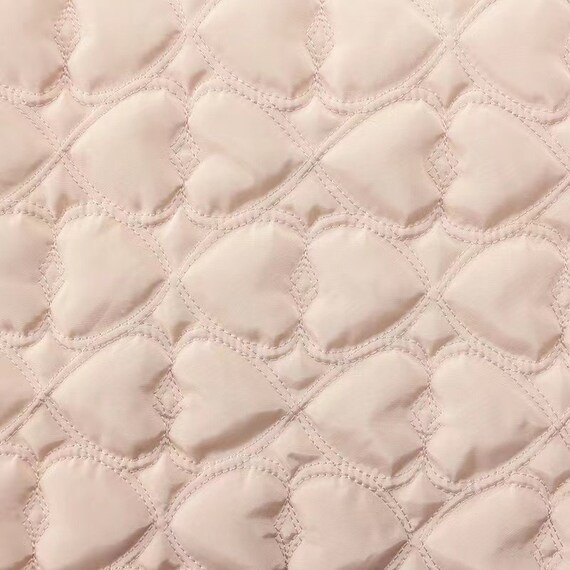 Textured quilted padded fabric by the yard