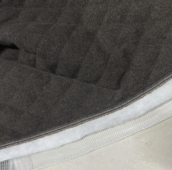 Embroidered quilted padded fabric by the yard