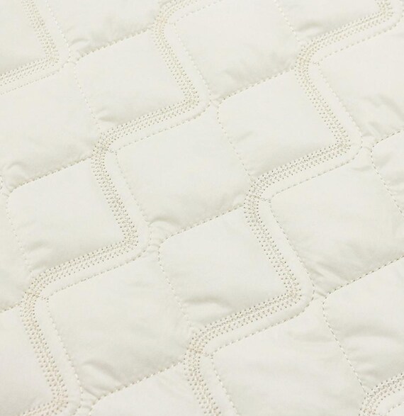 Embroidered Textured quilted padded fabric by the yard
