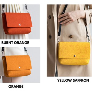 Puede incluir: Tres bolsos bandolera de fieltro en diferentes colores: naranja quemado, naranja y azafr&aacute;n amarillo. Cada bolso tiene un cierre de solapa con un bot&oacute;n plateado.