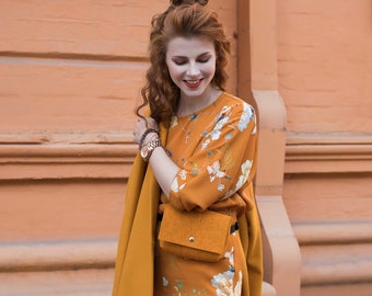 Orange Merino Wool Felt Belt Bag Woolberry Purse on a belt made of genuine leather.