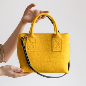 Yellow saffron women’s shoulder felt medium-sized zip-closure bag