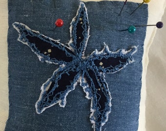 Blue on blue pin cushion