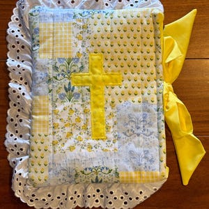 Yellow patchwork floral Quilted Bible Cover with cross appliqué and eyelet lace