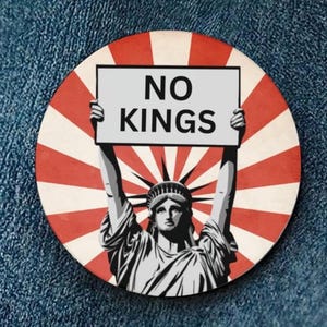 May include: A round button with a red and white sunburst design. The Statue of Liberty is depicted holding a sign that reads "NO KINGS" in black text. The button is set against a blue denim background.