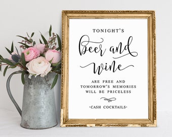 May include: A gold framed sign with the text "TONIGHT'S Beer and Wine ARE FREE AND TOMORROW'S MEMORIES WILL BE PRICELESS - CASH COCKTAILS."